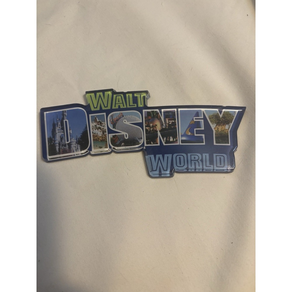 Walt Disney World Blue Acrylic 3-D Different Pix Of Parks In The "Disney" Magnet